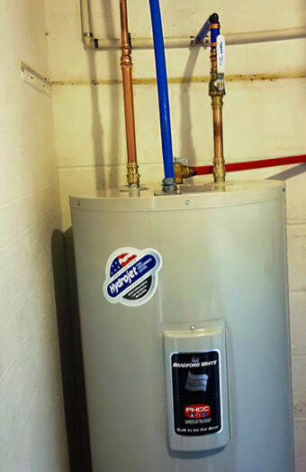 https://woodlandshotwater.com.au/uploads/2025/06/electric-hot-water-system-32554.jpg