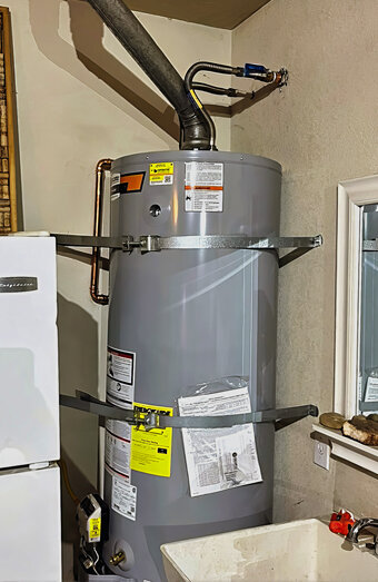 https://woodlandshotwater.com.au/uploads/2025/06/electric-hot-water-system-58767.jpg