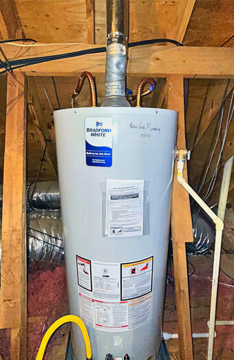 https://woodlandshotwater.com.au/uploads/2025/06/electric-hot-water-system-90253.jpg