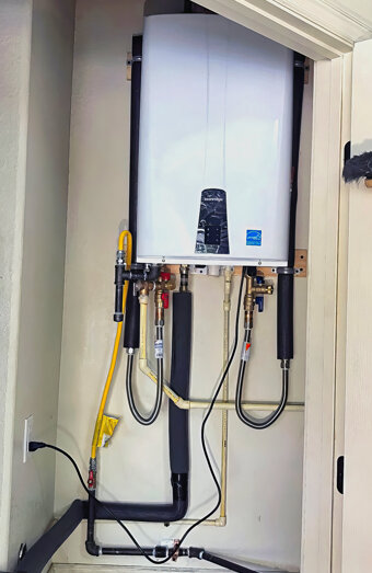 https://woodlandshotwater.com.au/uploads/2025/06/instant-hot-water-systems-35536.jpg