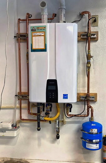 https://woodlandshotwater.com.au/uploads/2025/06/instant-hot-water-systems-42978.jpg