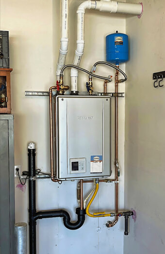https://woodlandshotwater.com.au/uploads/2025/06/instant-hot-water-systems-98444.jpg