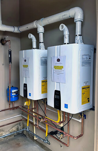 https://woodlandshotwater.com.au/uploads/2025/06/thermostatic-water-systems-21158.jpg